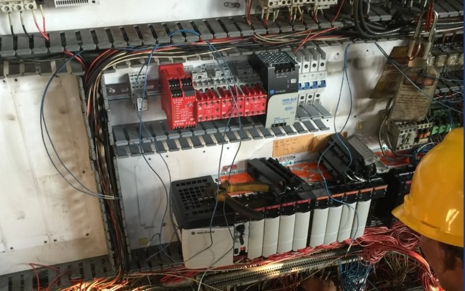 HAZS engineer working on a refurbished PLC / control logic panel